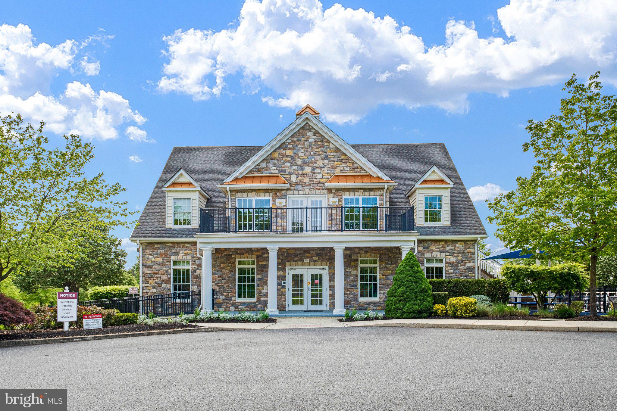 407 Nattull Drive Bear, DE 19701 - Photo 60 of 65 a front view of a house with a garden