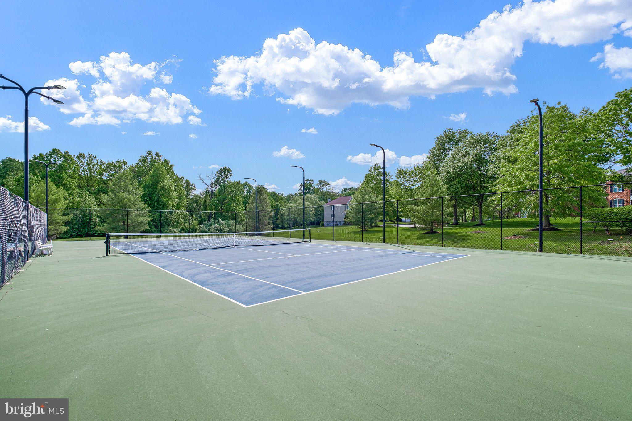 407 Nattull Drive Bear, DE 19701 - Photo 62 of 65 a view of an outdoor space and tennis court