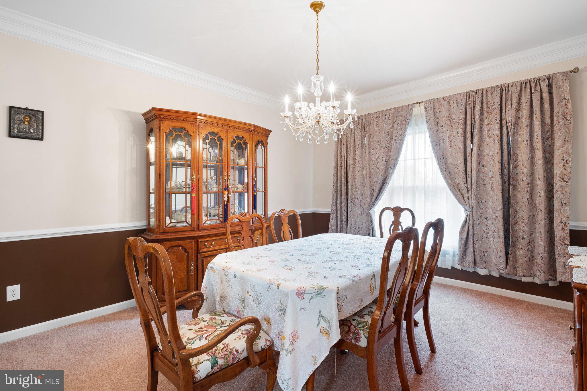 407 Nattull Drive Bear, DE 19701 - Photo 7 of 65 a view of a dining room with furniture window and outside view
