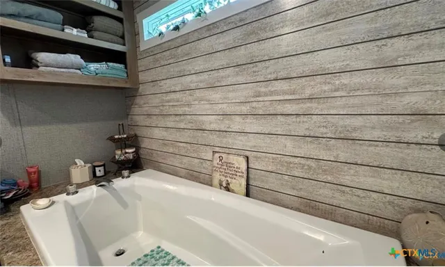 a bathroom with a bathtub