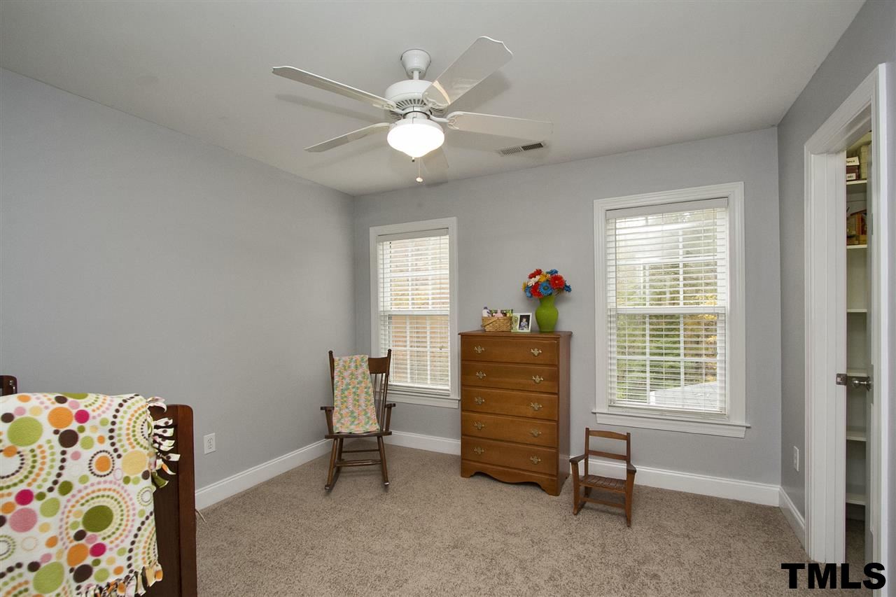 2012 Waterbrook Court Raleigh, NC 27603 - Photo 14 of 25 Upstairs office off of the Bonus Room/Loft with Walk-In Closet and Window. (Septic is permitted for 3 bedrooms.)