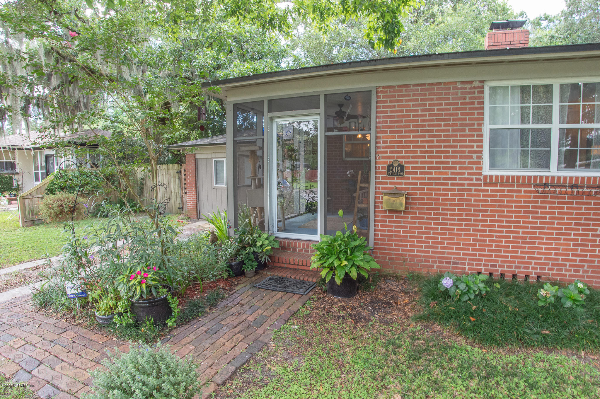 5418 Stetson Road Jacksonville, FL 32207 - Photo 3 of 34 a front view of a house with garden