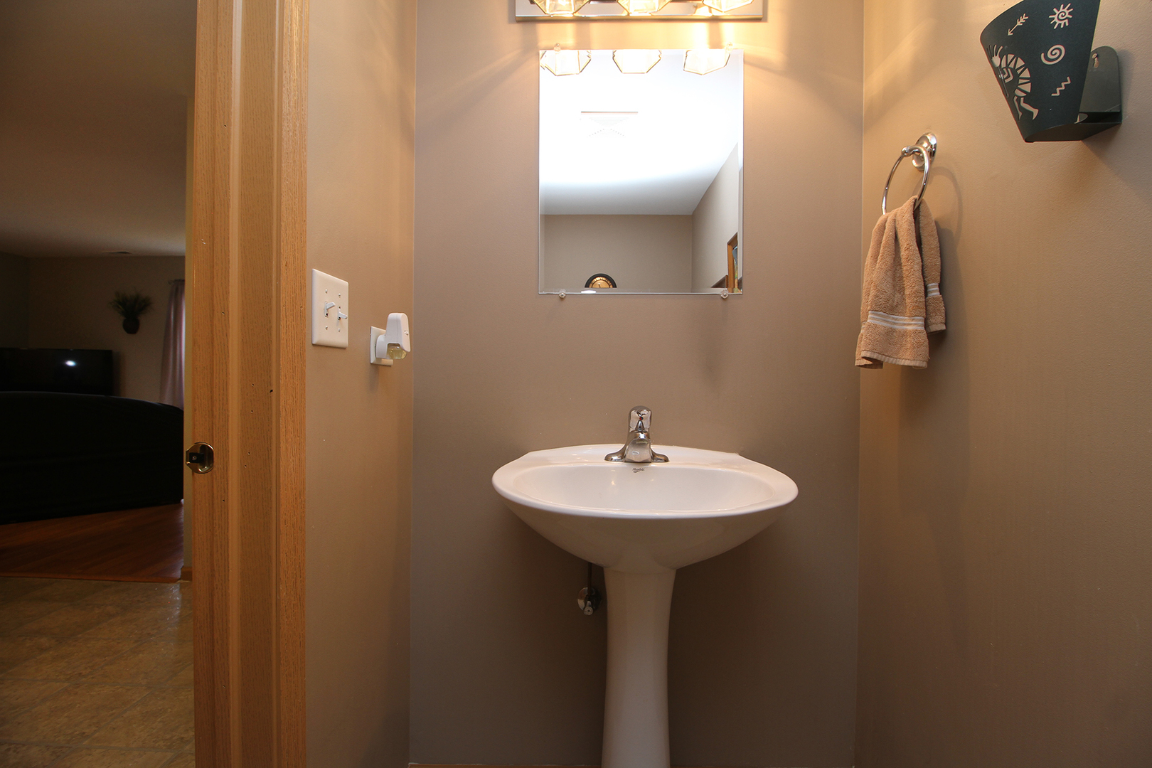 25265 Faraday Road, Unit 25265 Manhattan, IL 60442 - Photo 13 of 15 a bathroom with a sink a mirror and shower