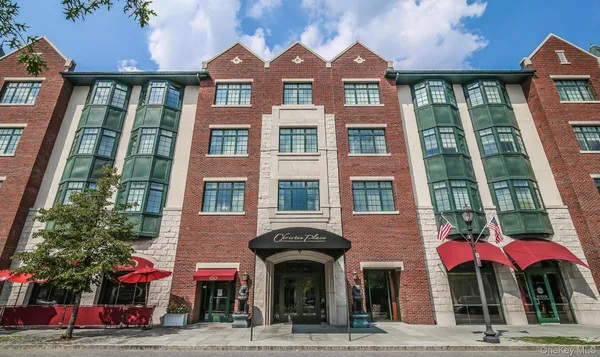 a front view of a multi story residential apartment building