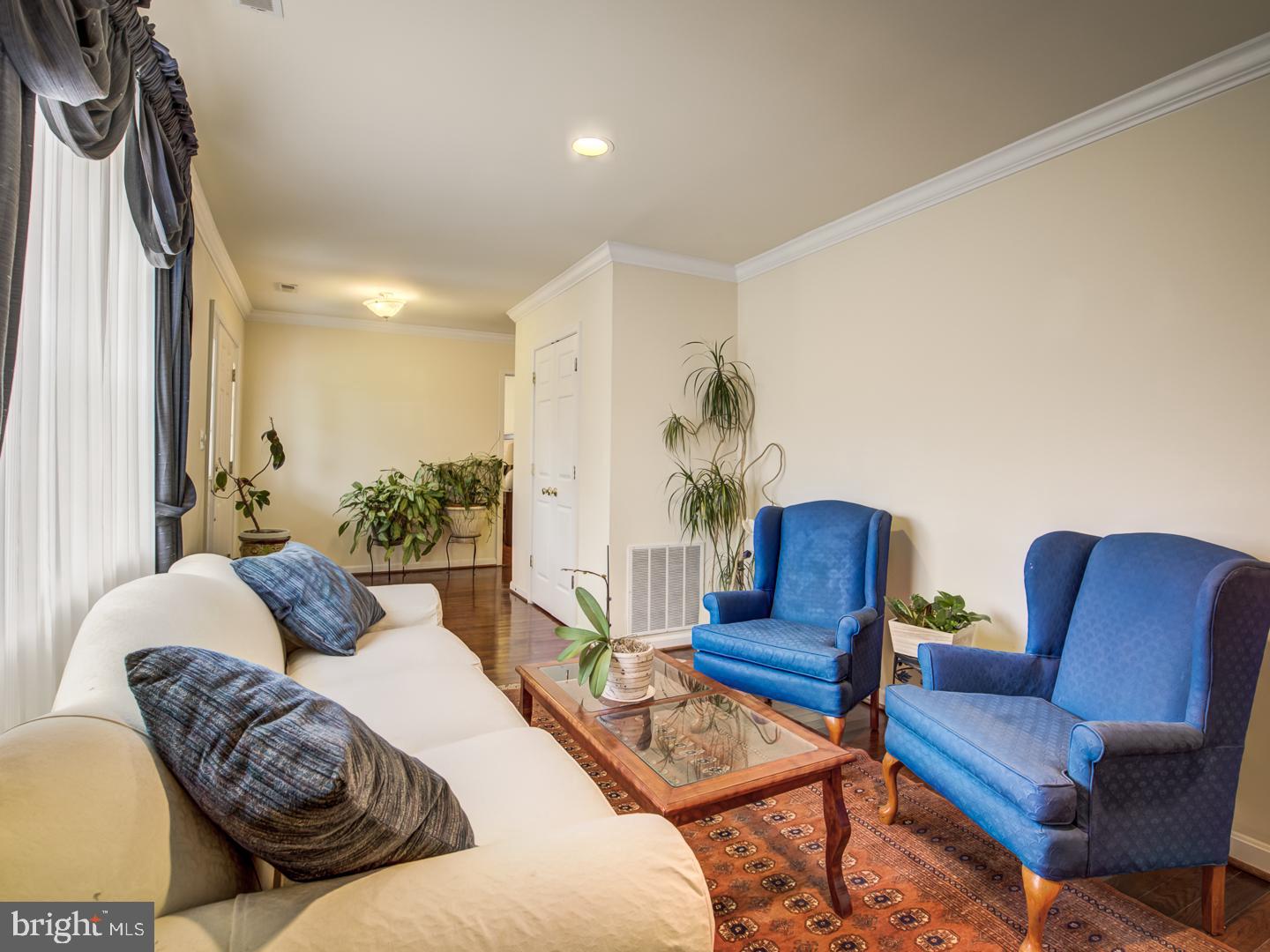 19400 White Ground Road Boyds, MD 20841 - Photo 11 of 59 a living room with furniture and a large window