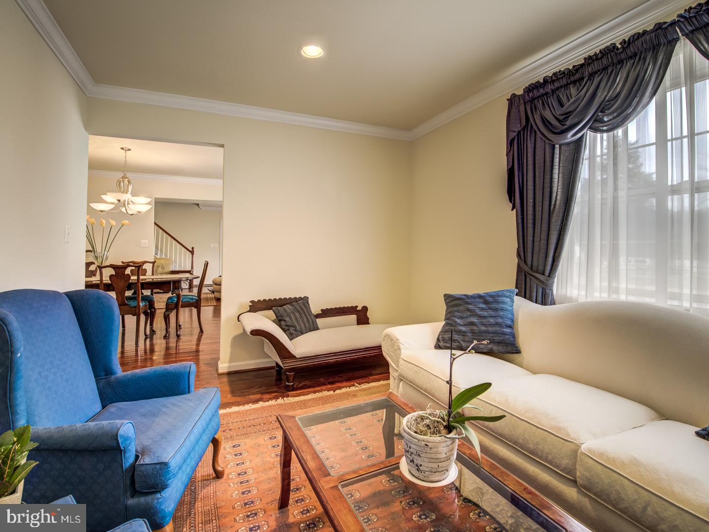 19400 White Ground Road Boyds, MD 20841 - Photo 12 of 59 a living room with furniture and a large window