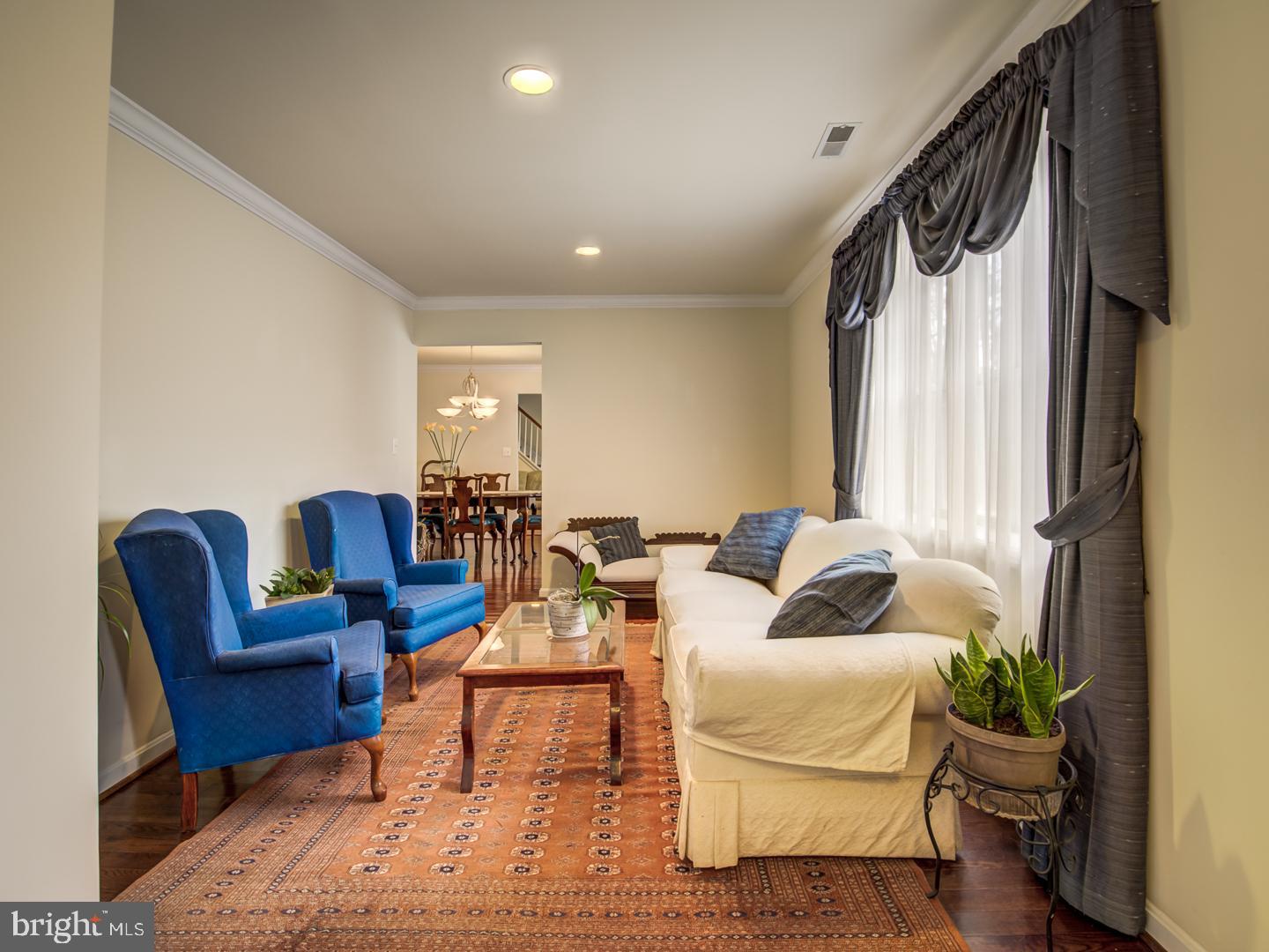 19400 White Ground Road Boyds, MD 20841 - Photo 13 of 59 a living room with furniture wooden floor and a window