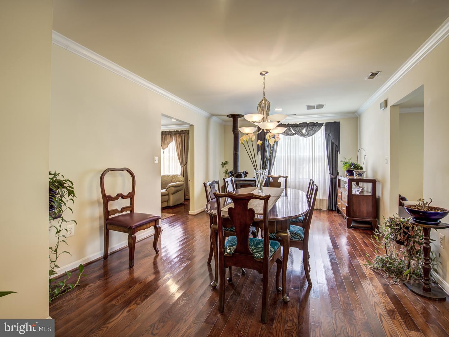 19400 White Ground Road Boyds, MD 20841 - Photo 24 of 59 a view of a a dining room with furniture window and wooden floor