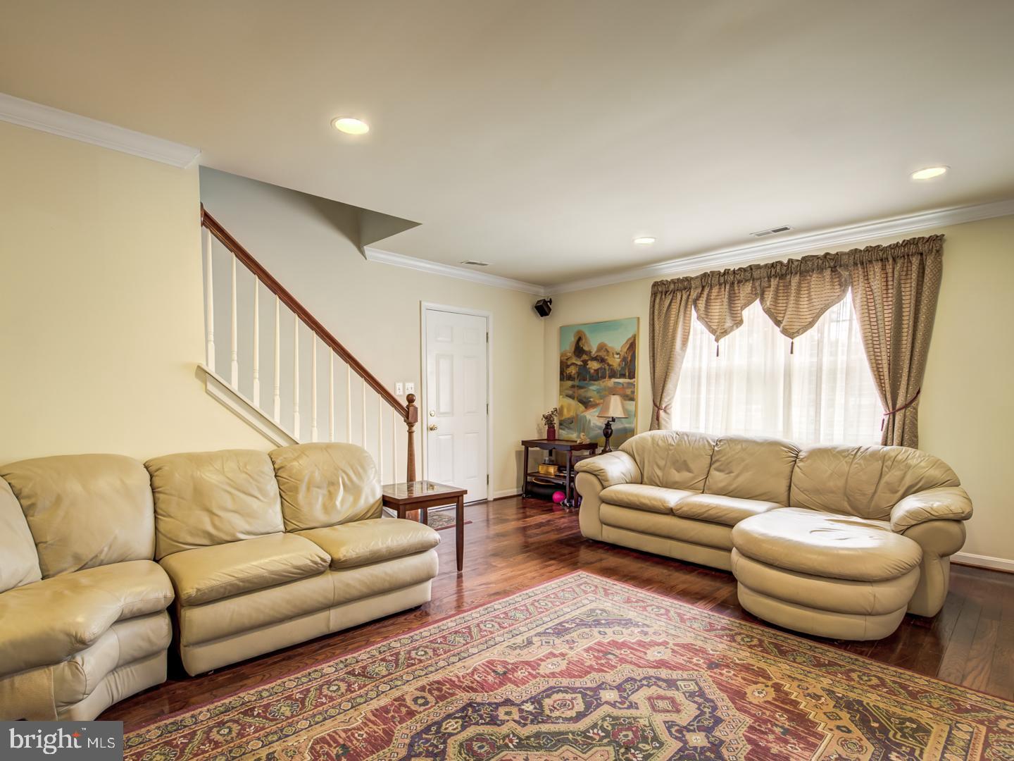 19400 White Ground Road Boyds, MD 20841 - Photo 30 of 59 a living room with furniture and a large window