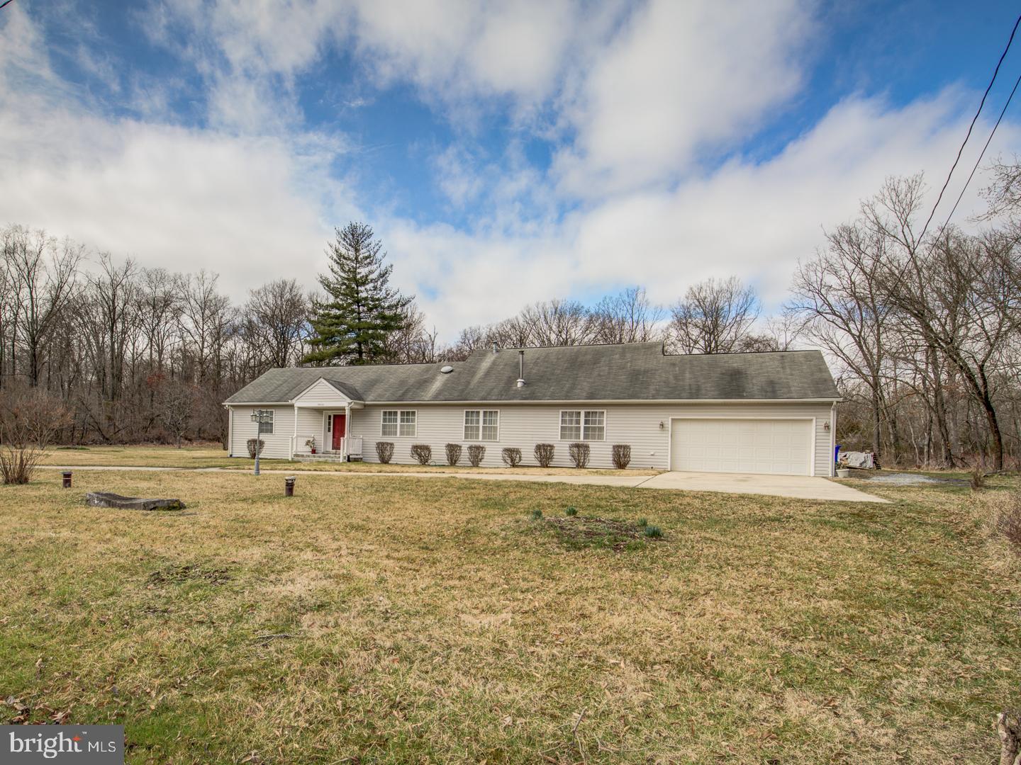 19400 White Ground Road Boyds, MD 20841 - Photo 4 of 59 a view of a house with a yard and a large tree