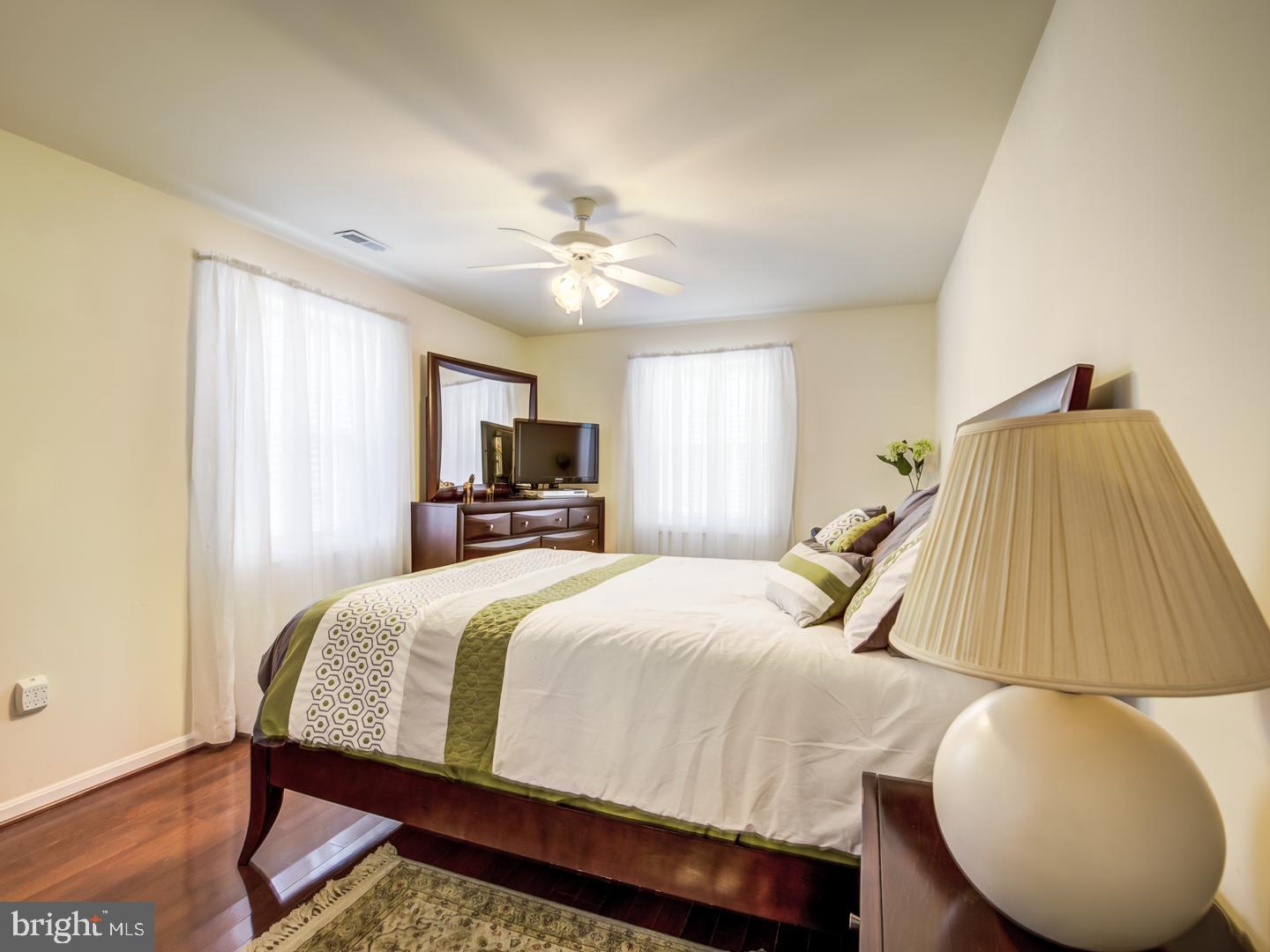 19400 White Ground Road Boyds, MD 20841 - Photo 41 of 59 a bed room with a bed and a chair