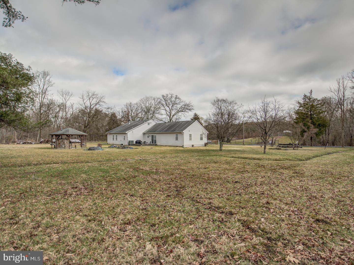 19400 White Ground Road Boyds, MD 20841 - Photo 57 of 59 a view of a field with trees in the background