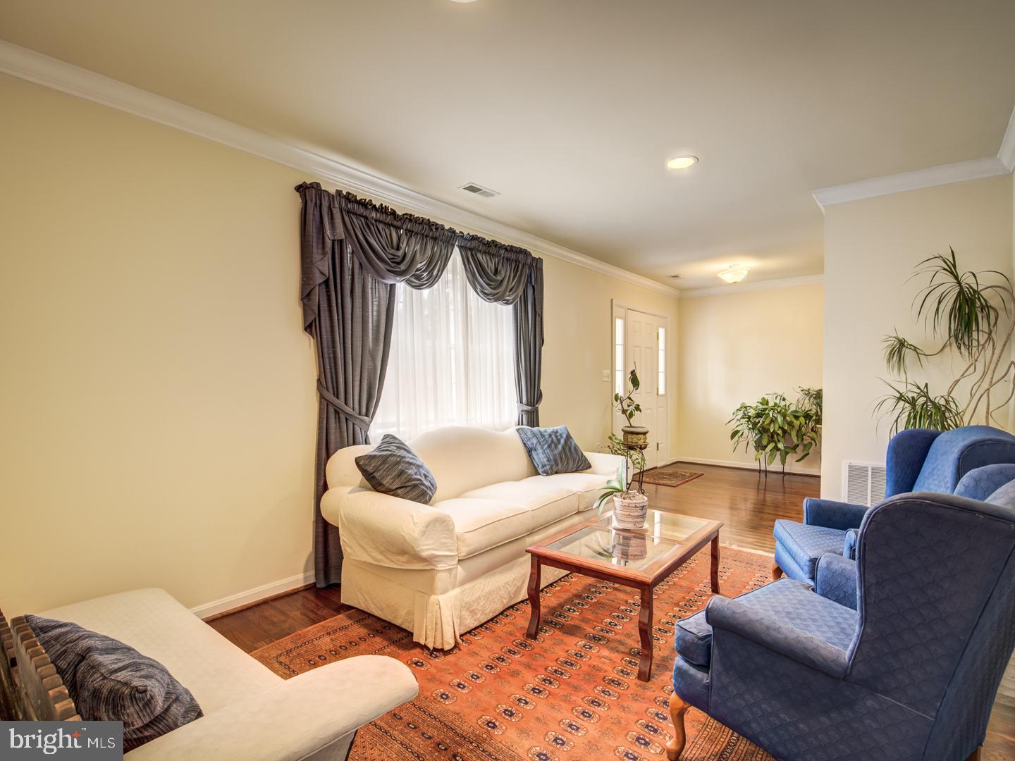 19400 White Ground Road Boyds, MD 20841 - Photo 10 of 59 a living room with furniture and a large window