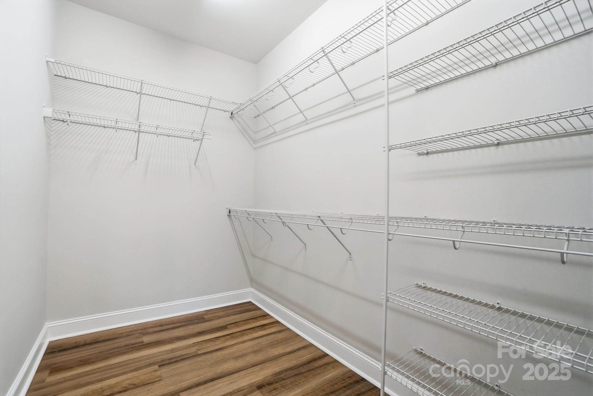 1012 Back Stretch Boulevard Indian Trail, NC 28079 - Photo 26 of 48 a view of a room with racks on the wall