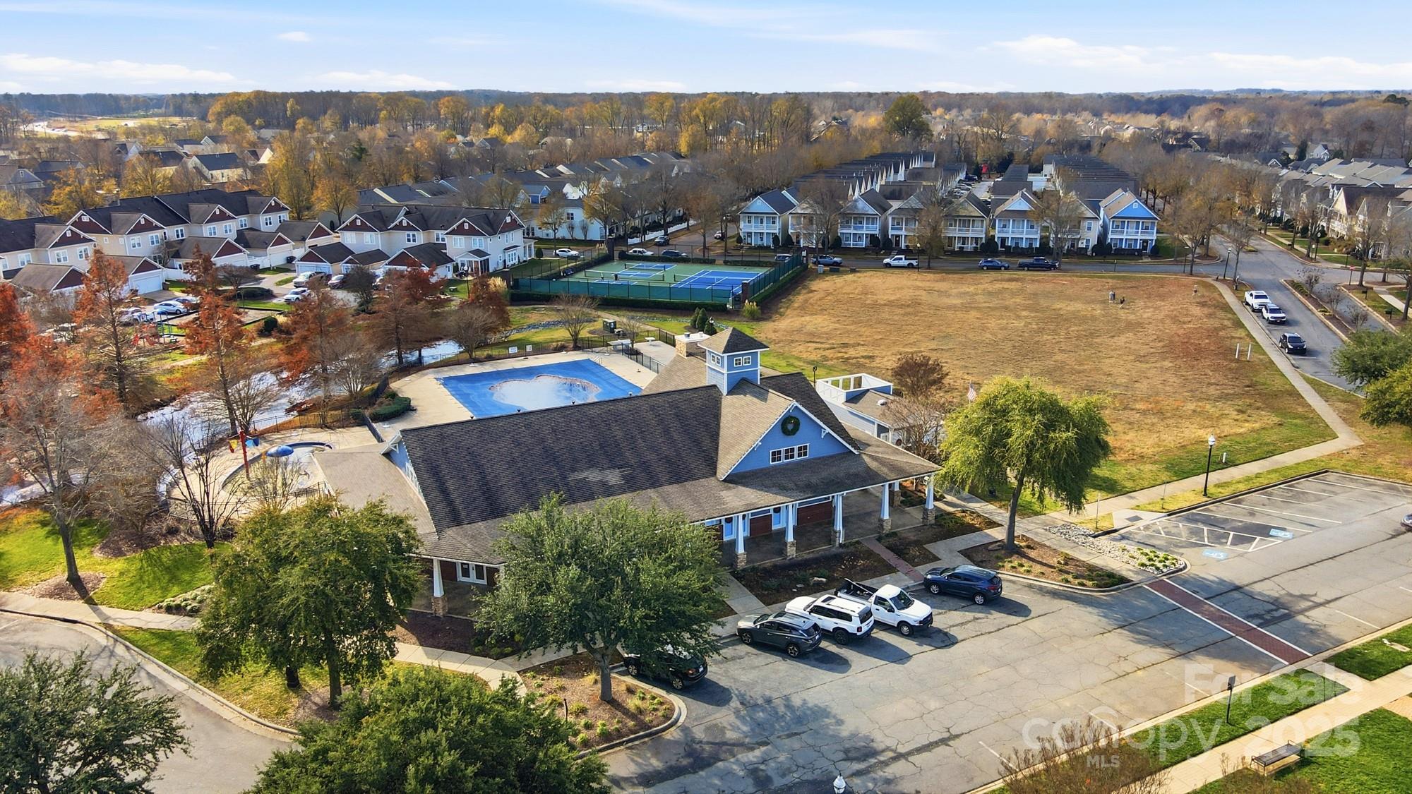 1012 Back Stretch Boulevard Indian Trail, NC 28079 - Photo 46 of 48 an aerial view of a house with a swimming pool yard and outdoor seating