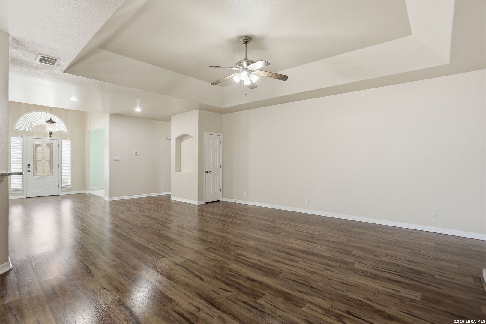 8814 Spanish Moss Windcrest, TX 78239 - Photo 12 of 50 a view of an empty room with wooden floor