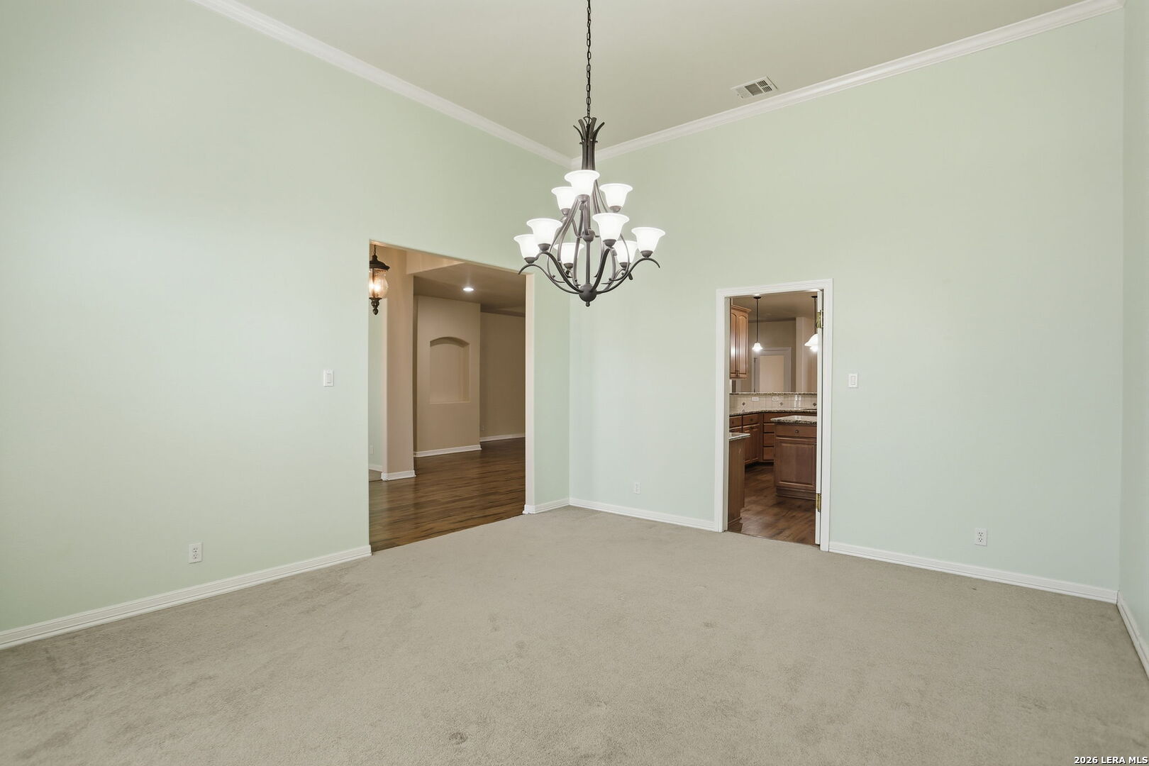 8814 Spanish Moss Windcrest, TX 78239 - Photo 8 of 50 a view of a chandelier in big room and chandelier