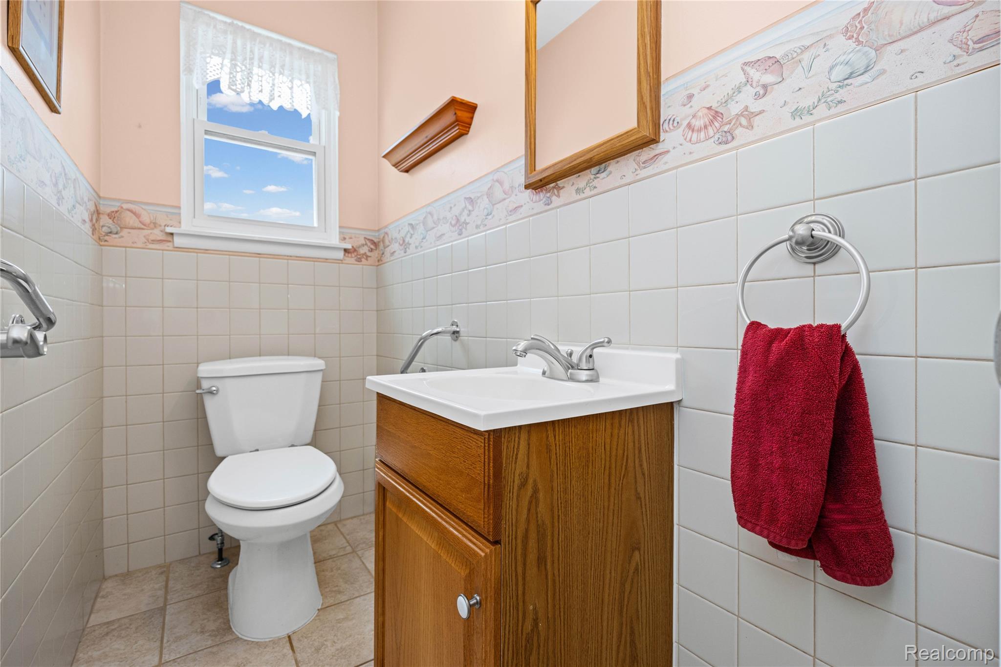 14743 Newburgh Road Livonia, MI 48154 - Photo 28 of 48 Bathroom with a wood-finish vanity and integrated sink