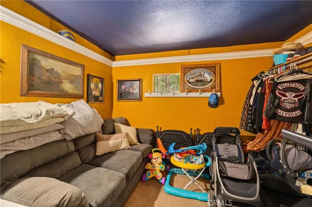 a bedroom with furniture and a bed