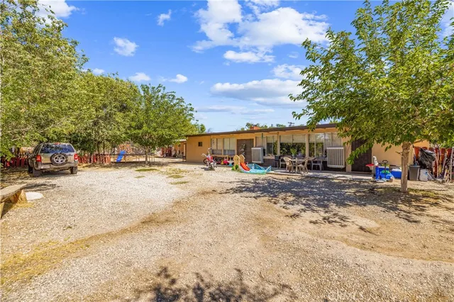 a view of street with parked cars