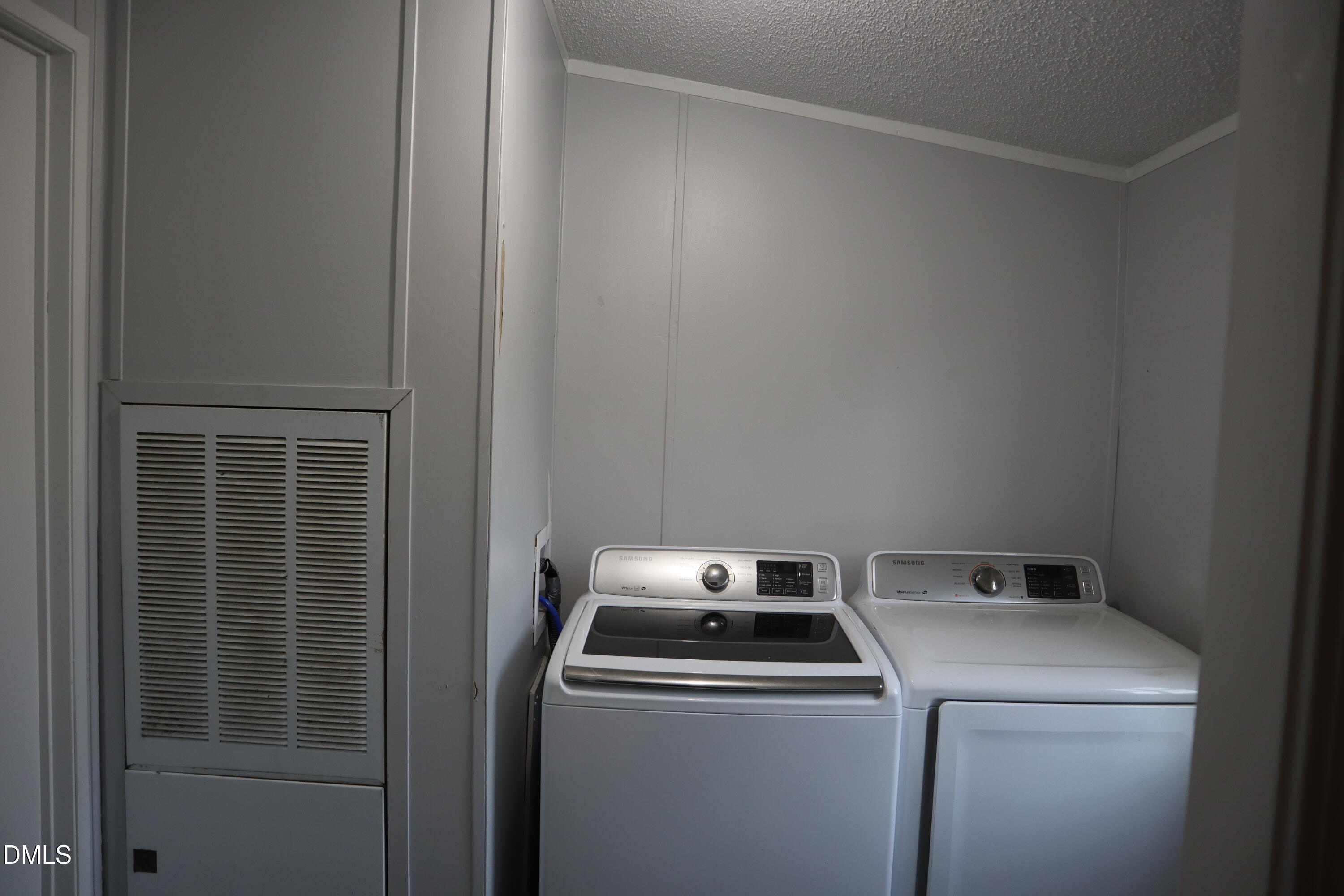 4762 Old Allensville Road Roxboro, NC 27574 - Photo 28 of 33 a utility room with dryer and washer