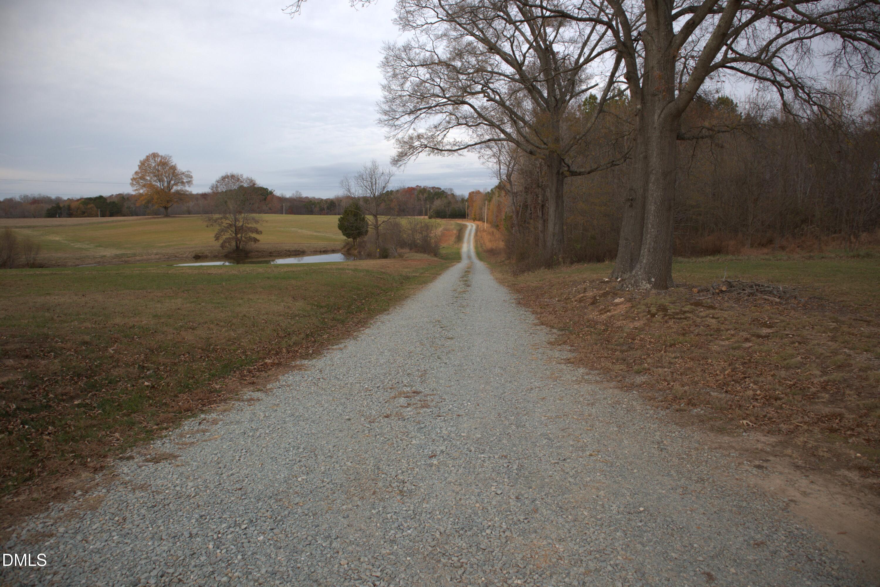 4762 Old Allensville Road Roxboro, NC 27574 - Photo 32 of 33 a view of a road with an ocean view