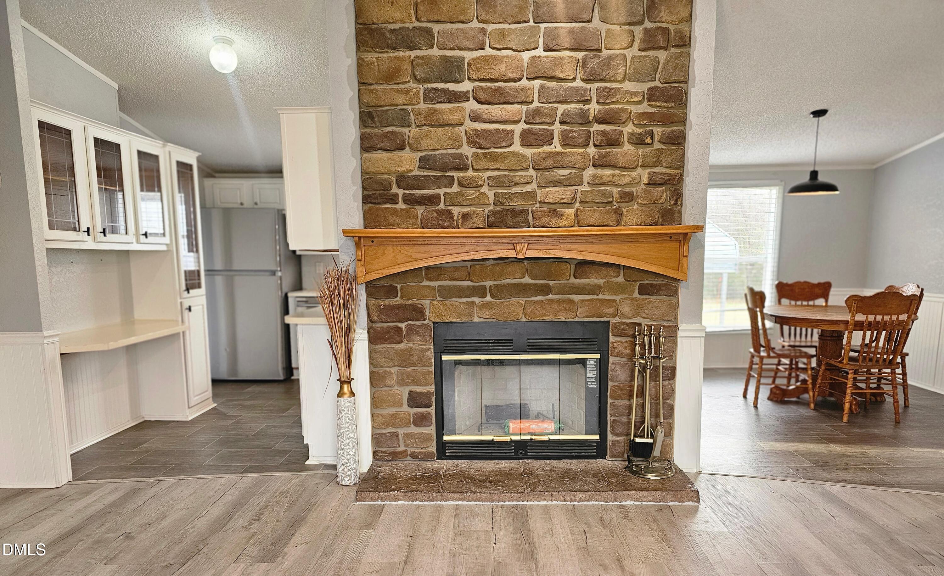 4762 Old Allensville Road Roxboro, NC 27574 - Photo 4 of 33 a view of a livingroom with a fireplace and furniture