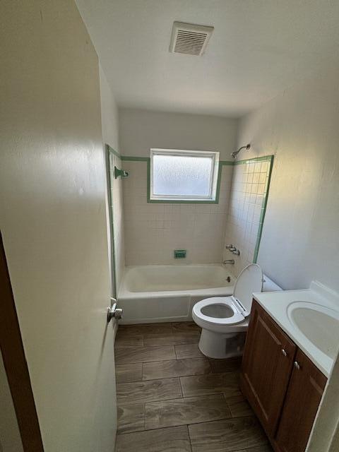 503 North 25th Street, Unit B Fort Pierce, FL 34947 - Photo 8 of 8 a bathroom with a sink a toilet and bathtub