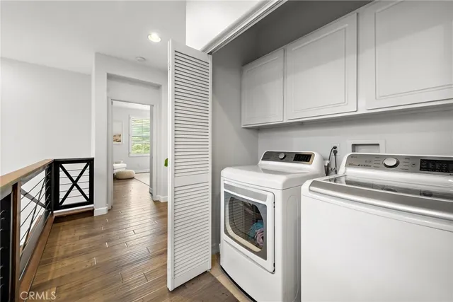 a storage room with washer and dryer