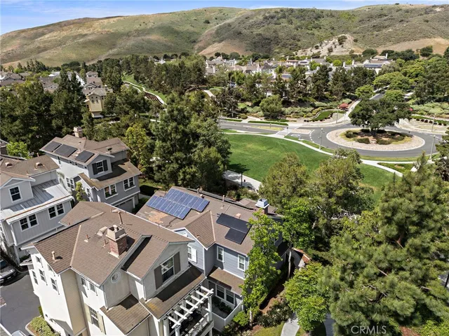 an aerial view of a house with a lake view