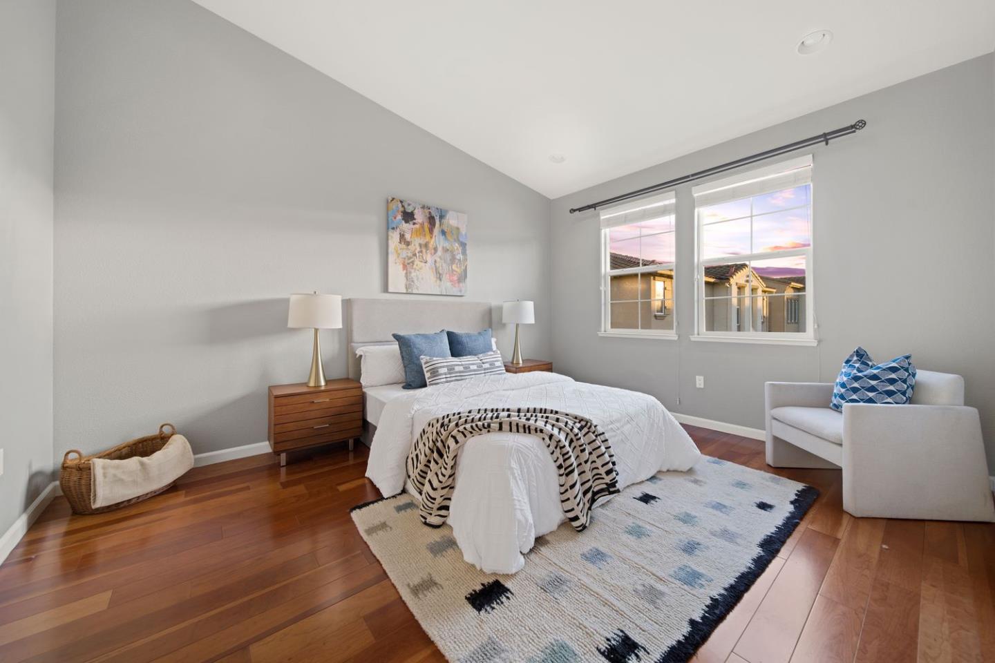 600 Mente Linda Loop Milpitas, CA 95035 - Photo 14 of 29 a bedroom with a bed and wooden floor