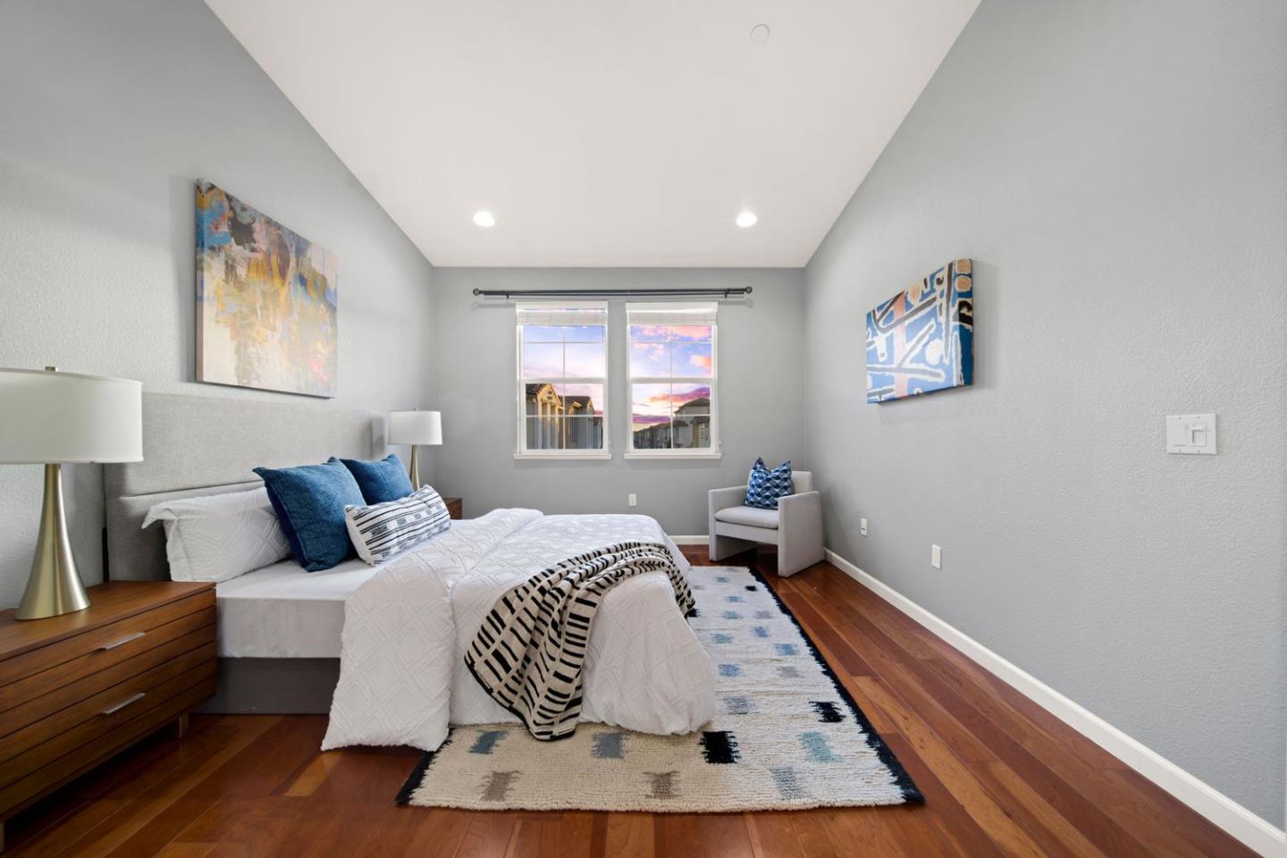 600 Mente Linda Loop Milpitas, CA 95035 - Photo 15 of 29 a bedroom with a bed and wooden floor