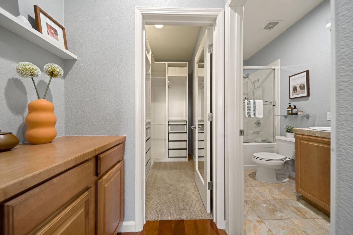 600 Mente Linda Loop Milpitas, CA 95035 - Photo 18 of 29 a bathroom with a granite countertop sink a toilet and shower