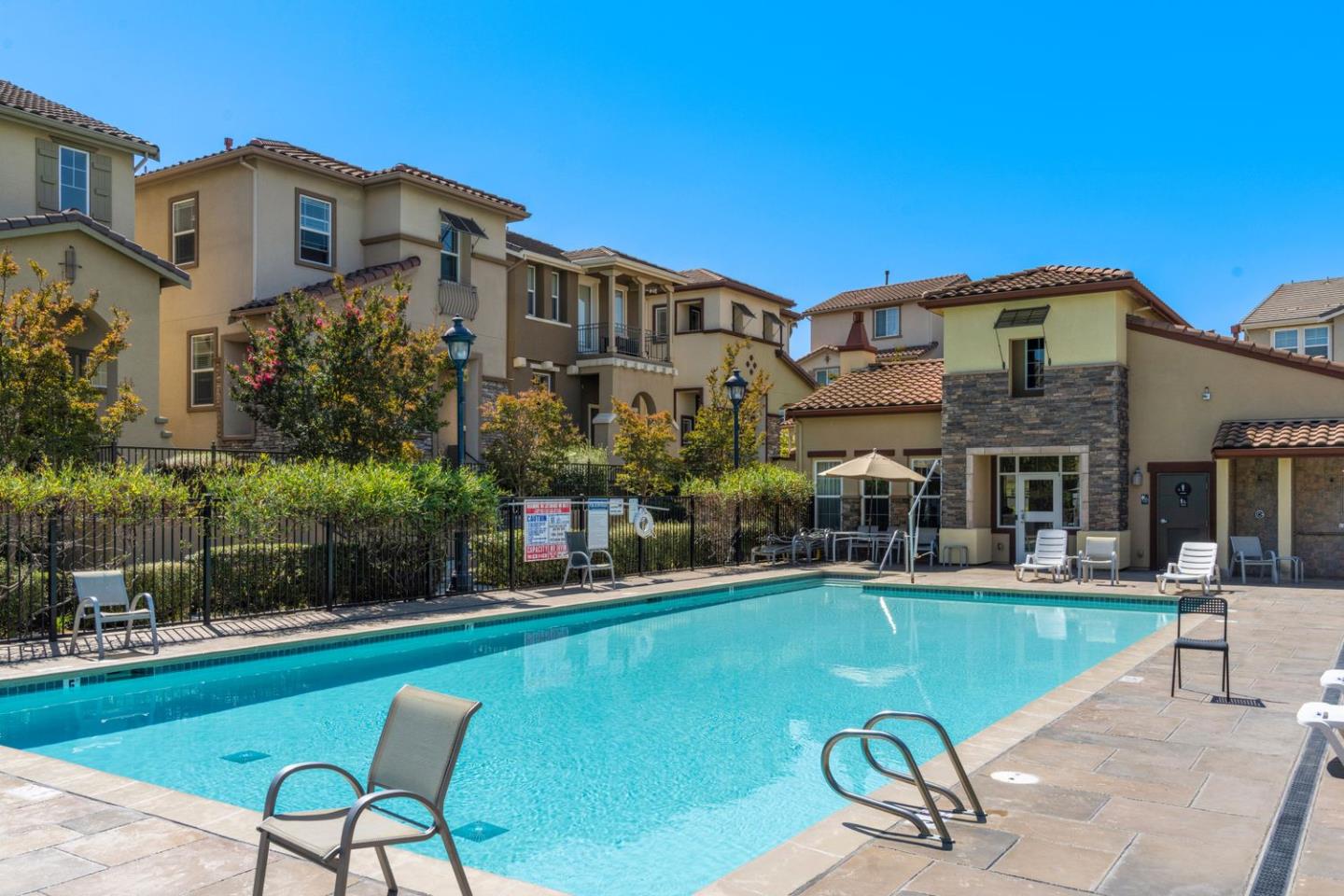 600 Mente Linda Loop Milpitas, CA 95035 - Photo 24 of 29 a view of a building with a yard