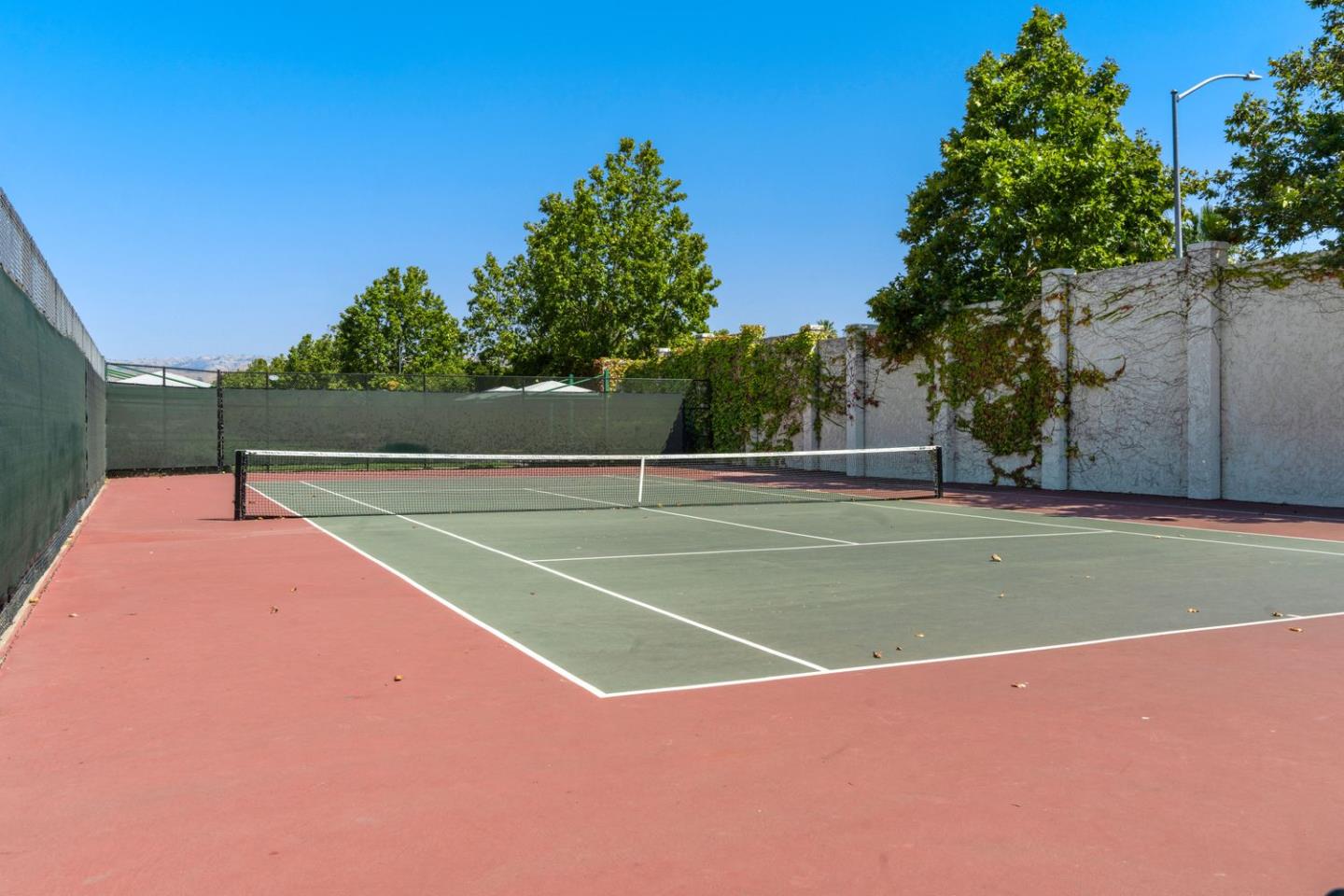 600 Mente Linda Loop Milpitas, CA 95035 - Photo 28 of 29 a view of a tennis court