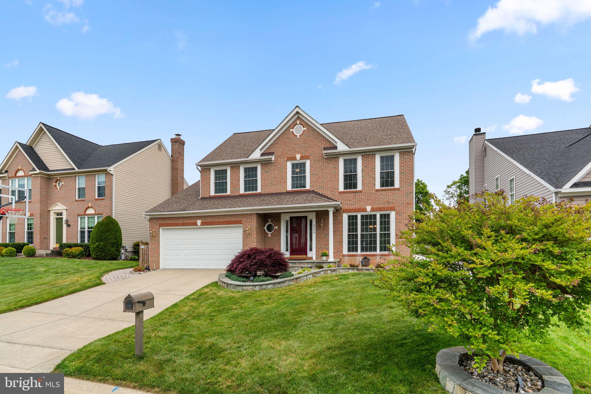 Brick front colonial in sought after Lyndwood