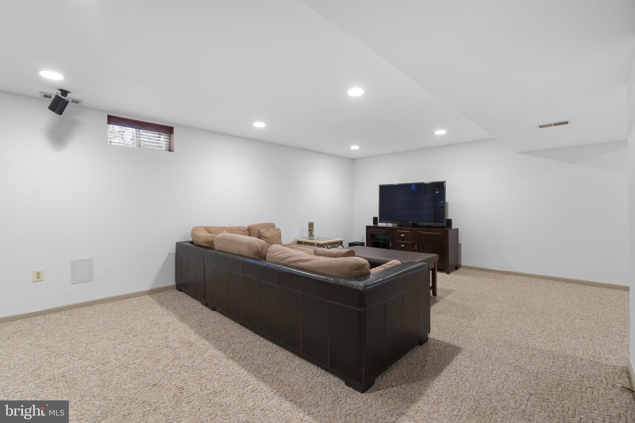 5904 Clear Ridge Road Elkridge, MD 21075 - Photo 36 of 58 Expansive rec room