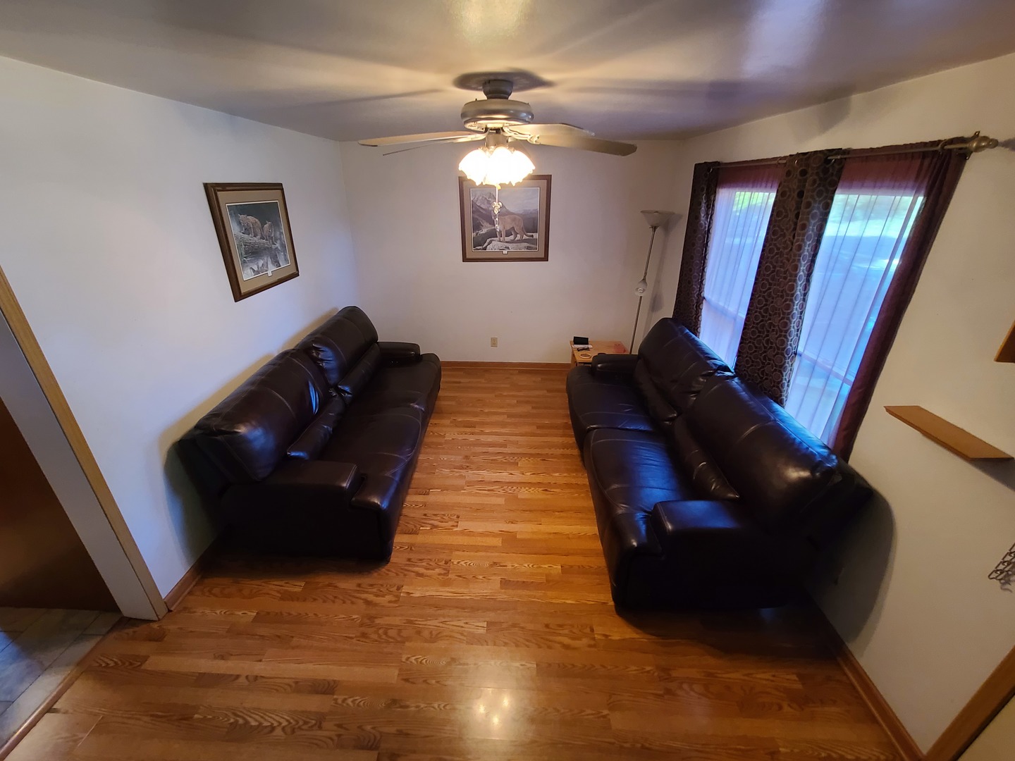 419 Foster Road Wauconda, IL 60084 - Photo 26 of 32 a living room with furniture and a mirror