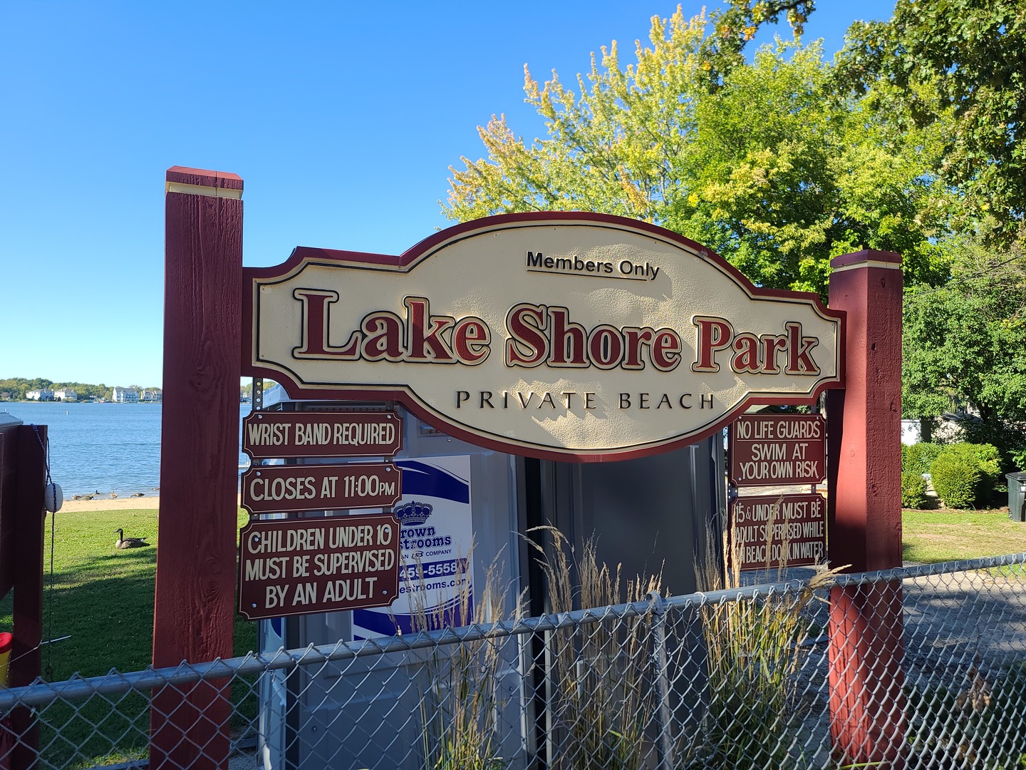 419 Foster Road Wauconda, IL 60084 - Photo 32 of 32 a view of a sign board with a small yard and wooden fence