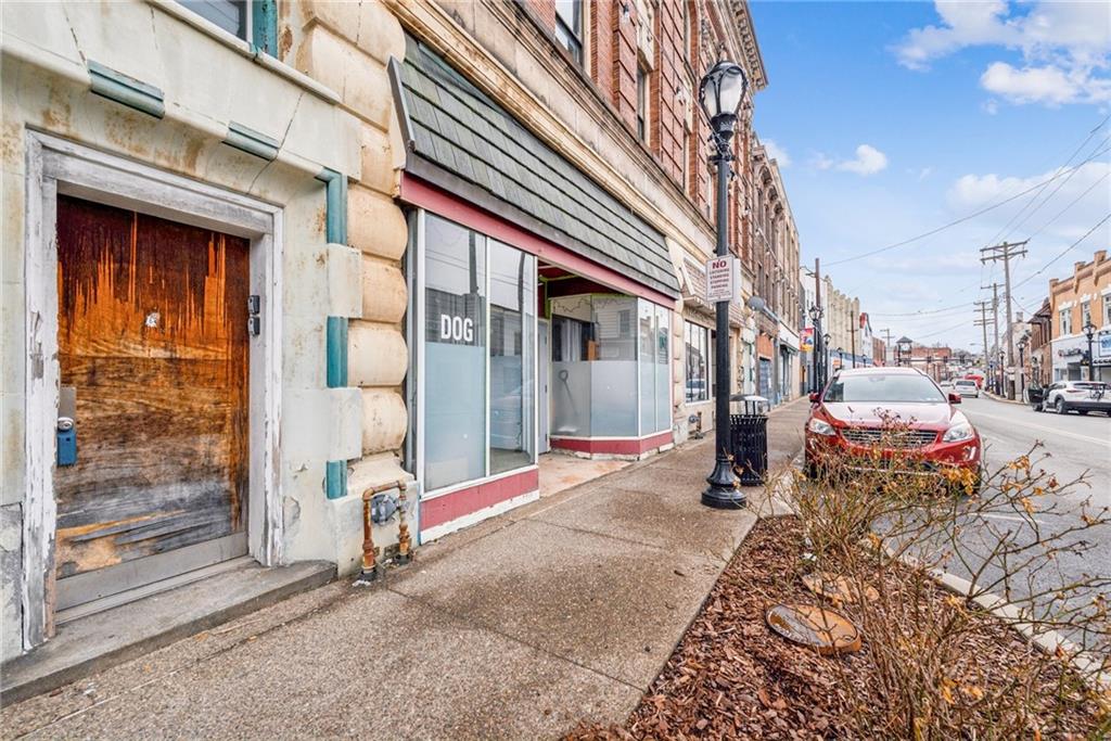 215-217 Brownsville Road Pittsburgh, PA 15210 - Photo 3 of 9 a view of a brick building with many windows