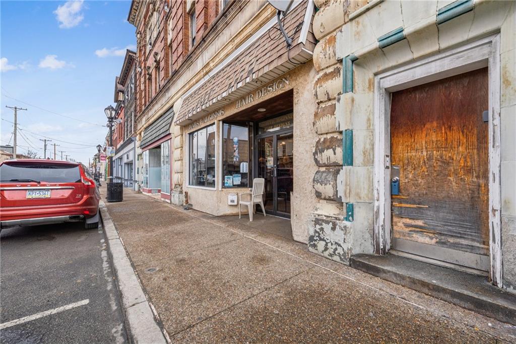 215-217 Brownsville Road Pittsburgh, PA 15210 - Photo 4 of 9 a view of a car park in front of building