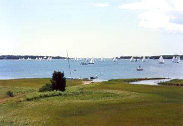 a view of a lake with a big yard