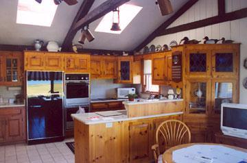 Undisclosed Address Osterville, MA 02655 - Photo 3 of 13 a view of a dining room with furniture