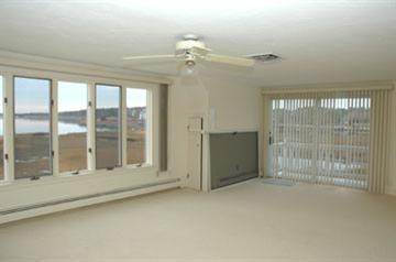 Undisclosed Address Osterville, MA 02655 - Photo 10 of 13 a view of an empty room with a window