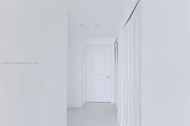 a bathroom with a toilet a sink and shower