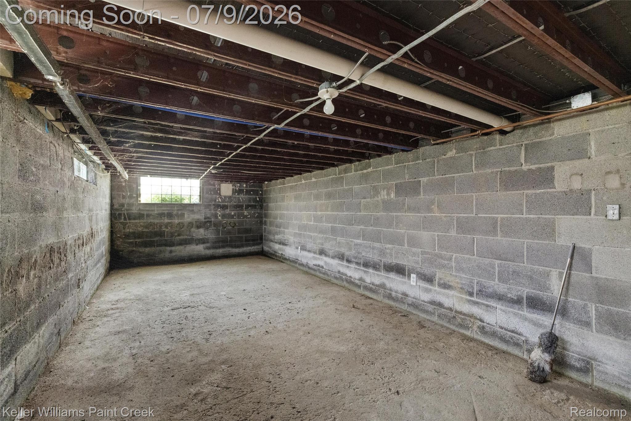 28780 School Section Road Richmond, MI 48062 - Photo 34 of 50 Unfinished basement featuring concrete block walls and an exposed ceiling with visible floor joists and utility lines