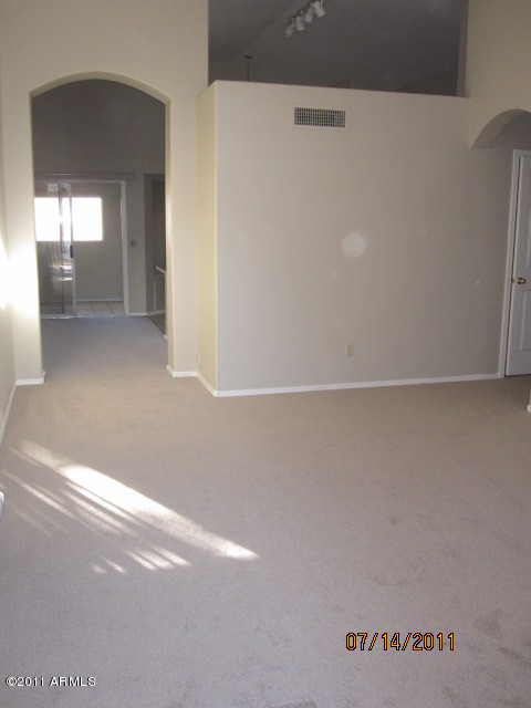 7589 West Calavar Road Peoria, AZ 85381 - Photo 7 of 13 Living Room