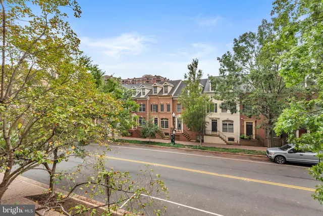 a view of a building with a street