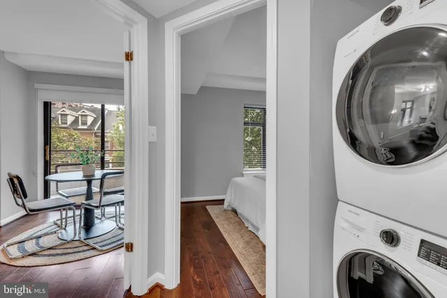 a view of a livingroom with furniture and windows