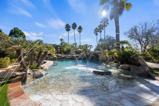 a backyard of a house with lots of green space